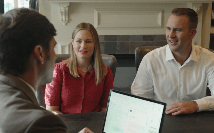 Kendall Mayes meeting with clients