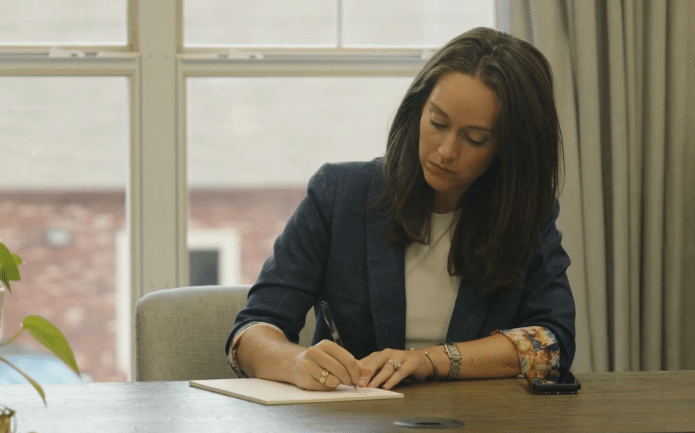 Shelby R. Hays taking notes