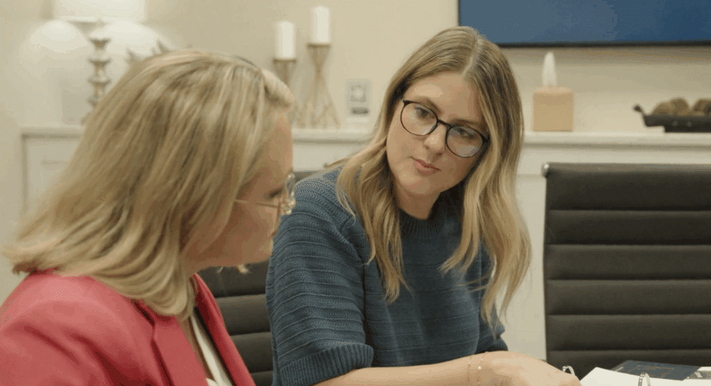 Brooke E. Baumert listening to client