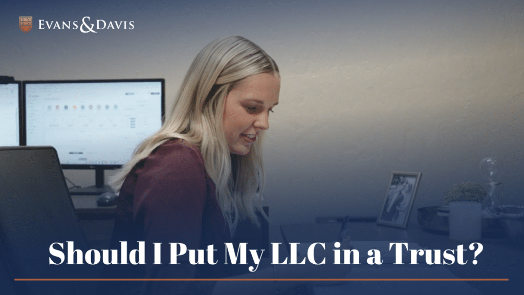 an attorney working on putting an LLC in a trust