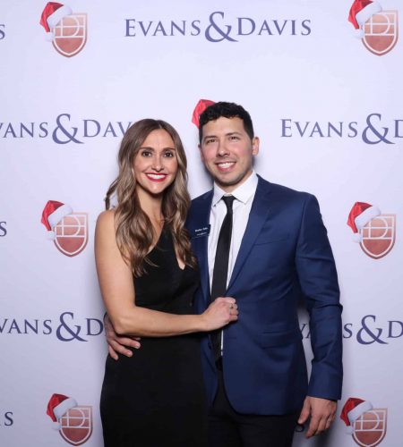 Courtney Solis and husband at Christmas party