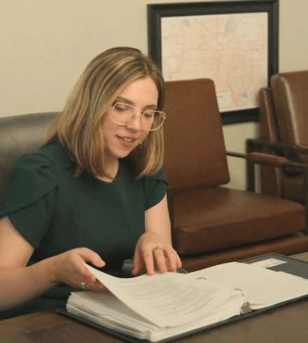 Katie A. MacKenzie reviewing documents