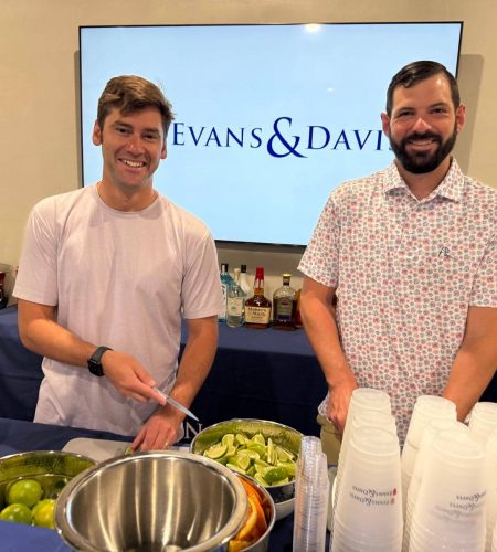 Kendall and Landon slicing limes at 4th of July party