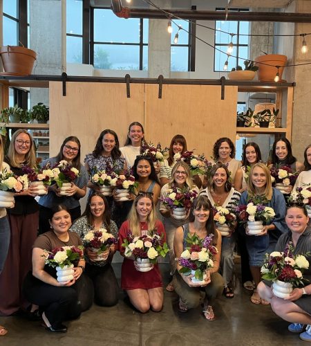 Team photo at Bouquet Making event at Evans & Davis